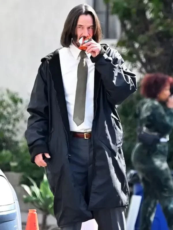 good-fortune-2025-keanu-reeves-black-coat-1170620567.webp